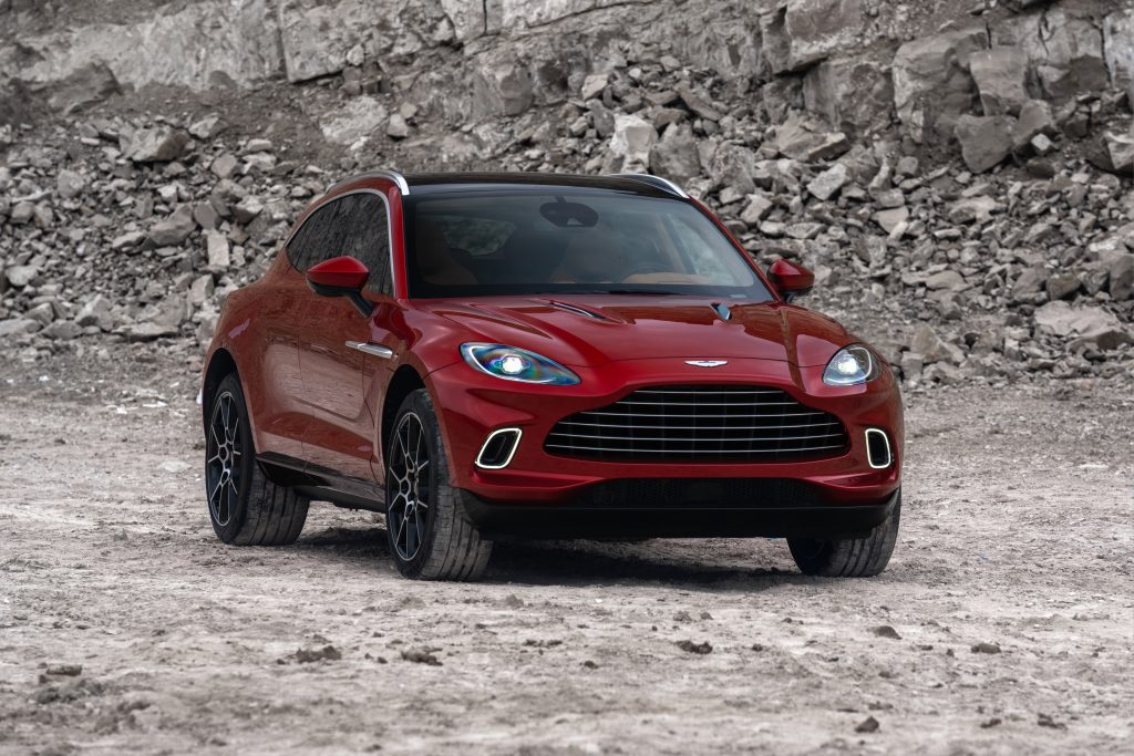 Front view of Aston Martin DBX on rocky terrain