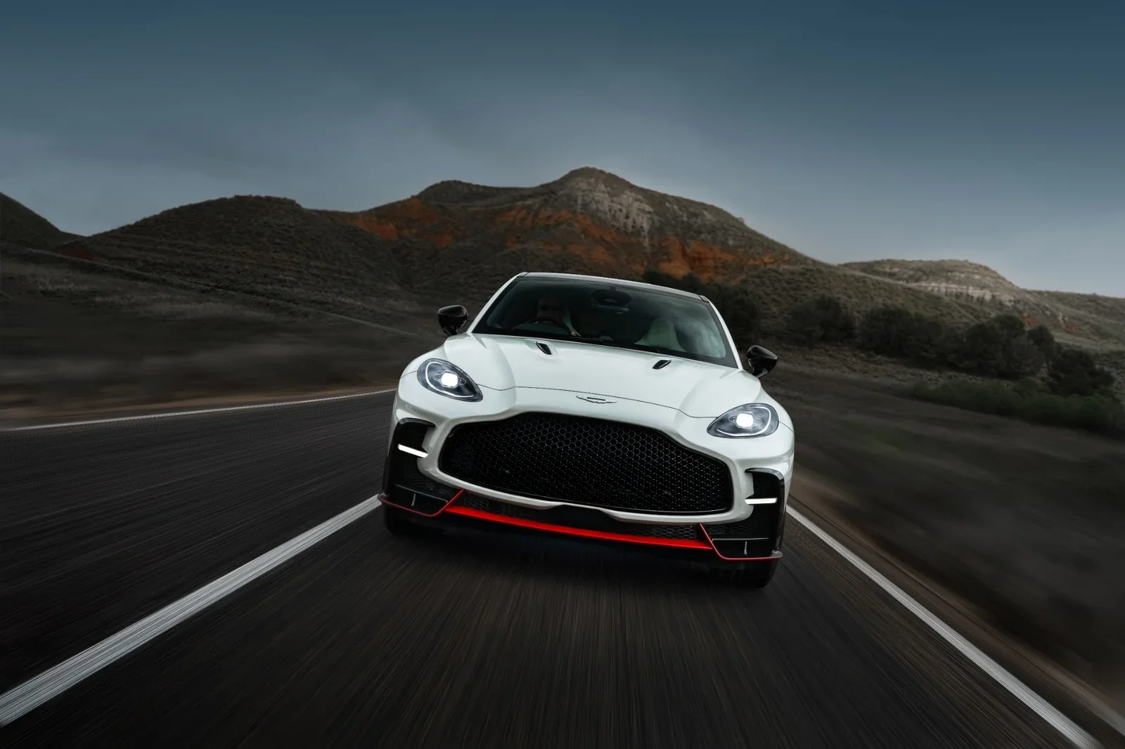 Aston Martin DBX S driving on the road near Aston Martin Rancho Mirage