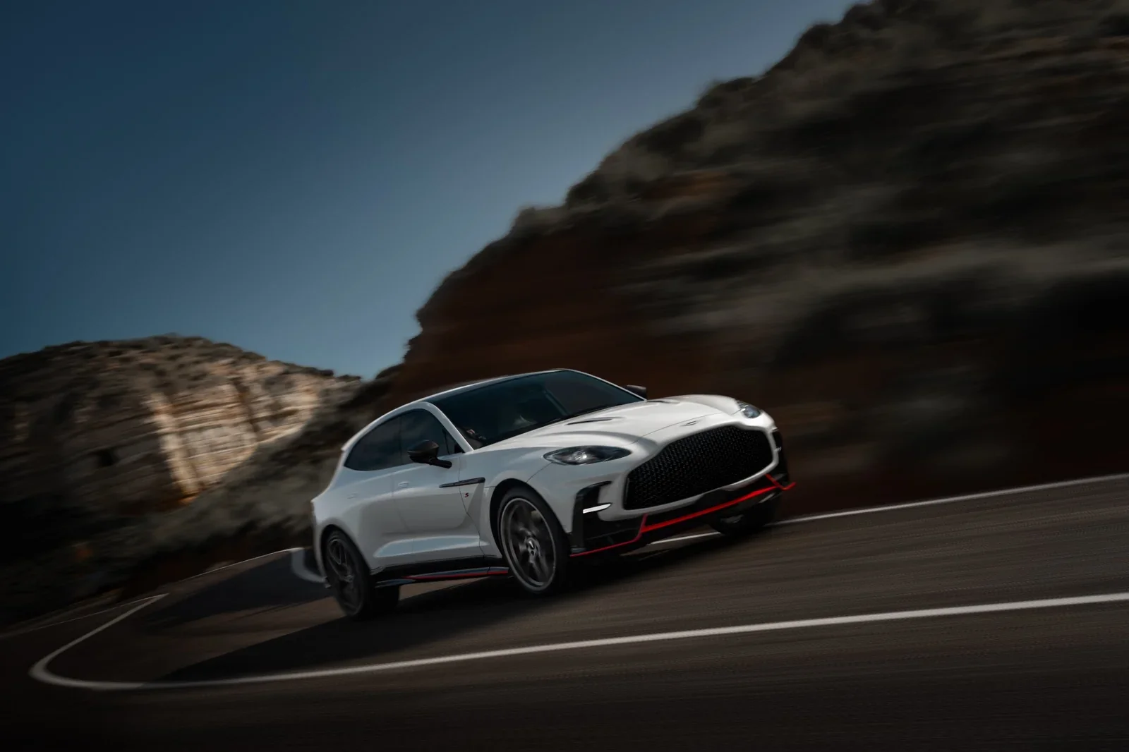 Aston Martin DBX S front three-quarter driving view near Aston Martin Rancho Mirage
