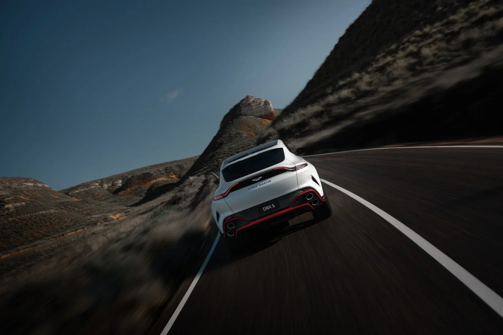Aston Martin DBX S rear driving view